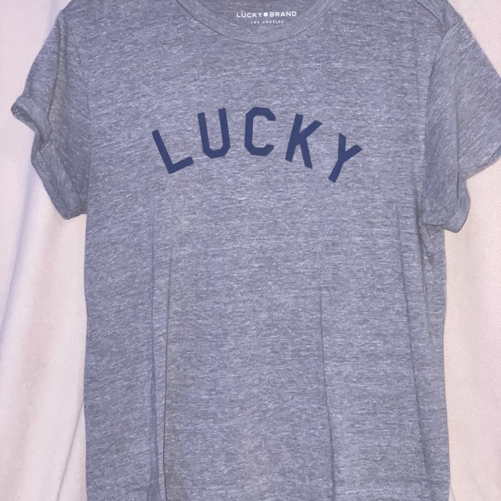 lucky brand; light grey and dark blue writing